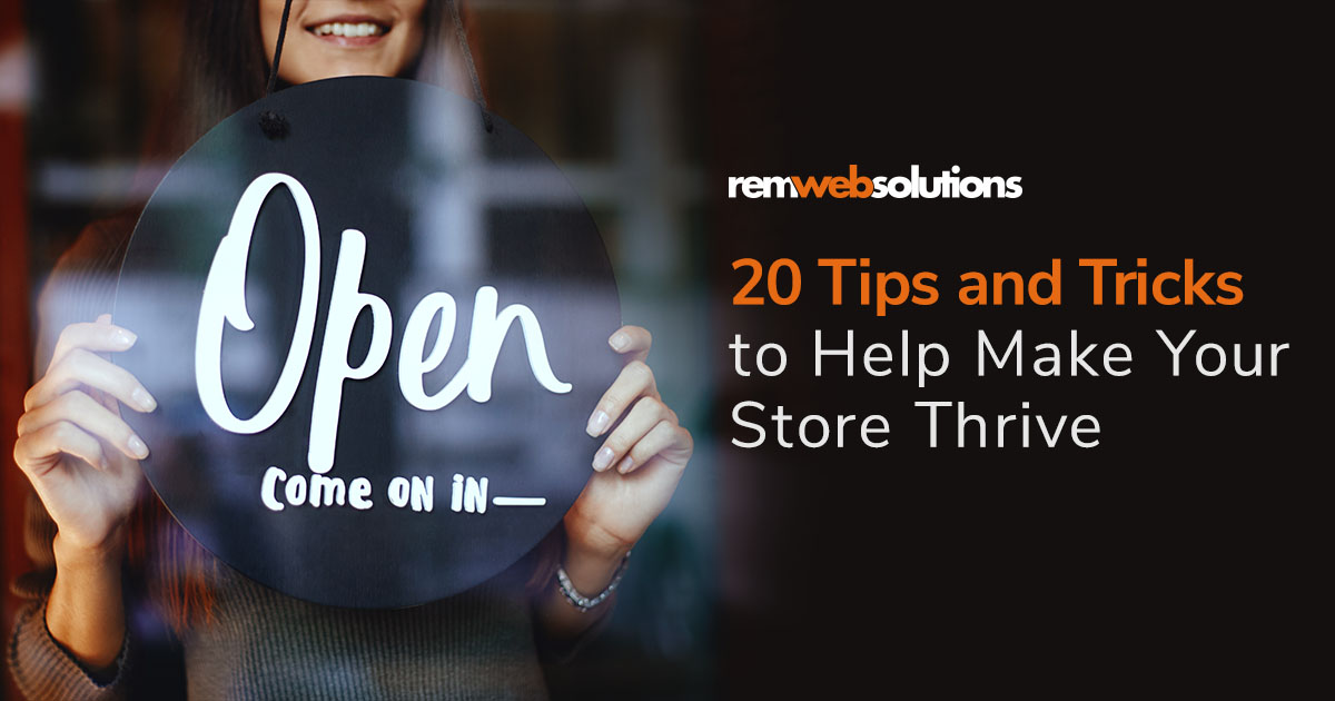 Woman holding a store's Open sign